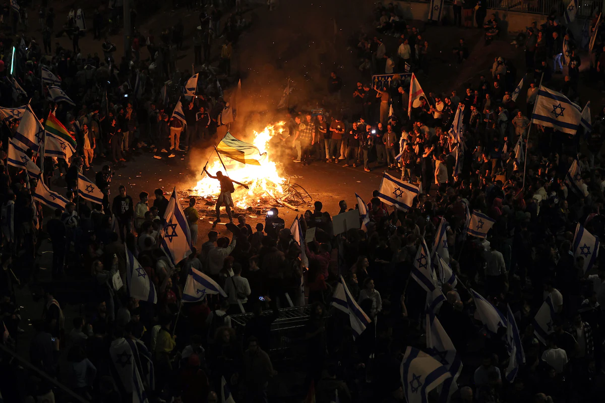 Israel's Judicial Overhaul Plan Delayed After Mass Protests and General Strike.