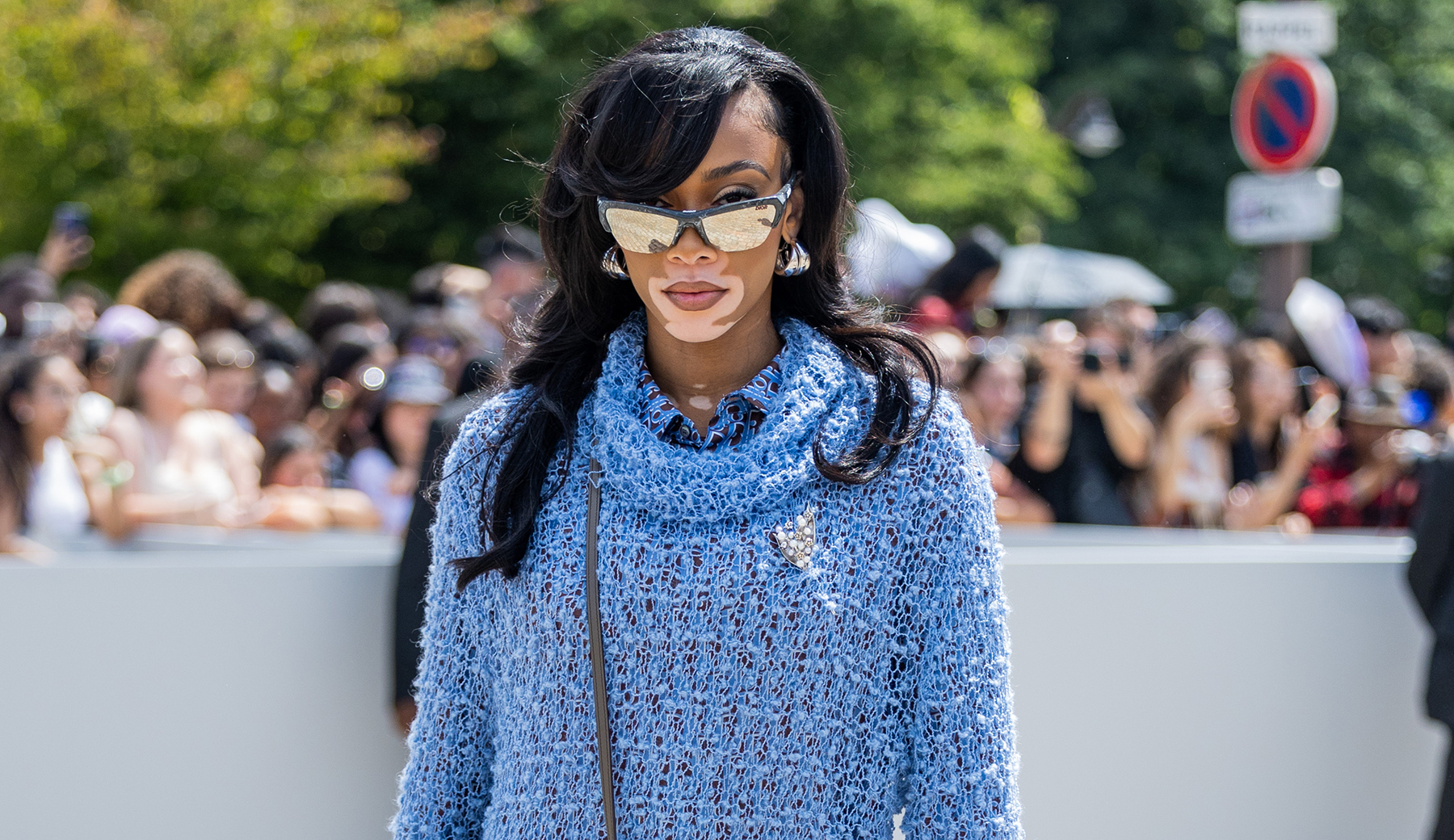 Featured image for Winnie Harlow's Preppy Style at Dior's Menswear Show.