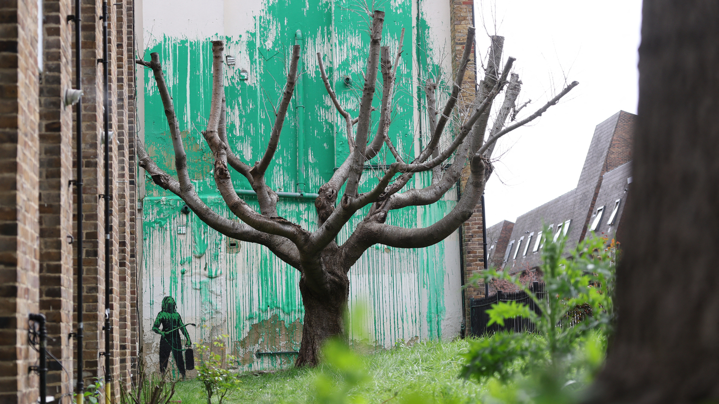 Featured image for "Banksy's Latest London Mural: A Green Optical Illusion in Finsbury Park"