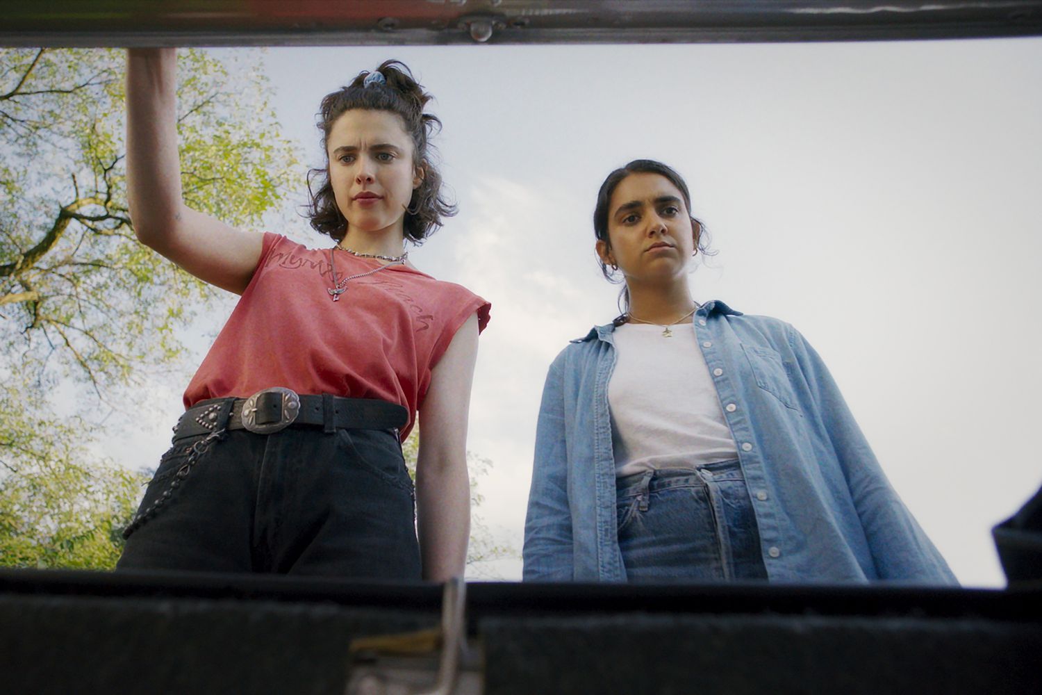 Featured image for Margaret Qualley and Geraldine Viswanathan star in wacky crime comedy 'Drive-Away Dolls' trailer.