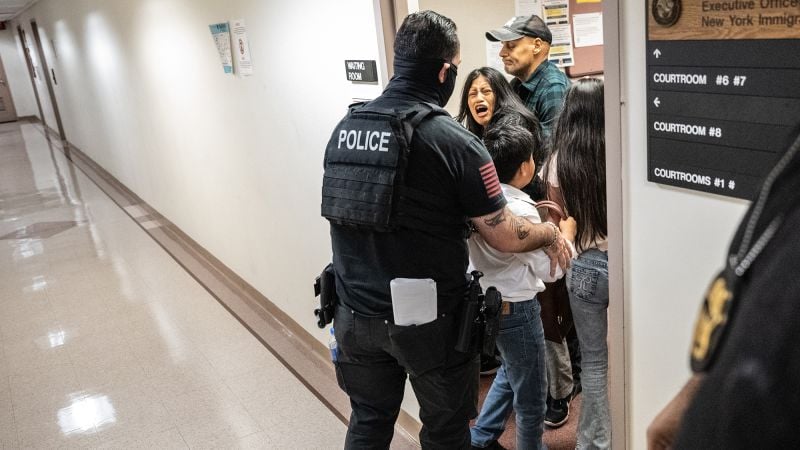 Featured image for ICE agent suspended after shoving woman during courthouse confrontation