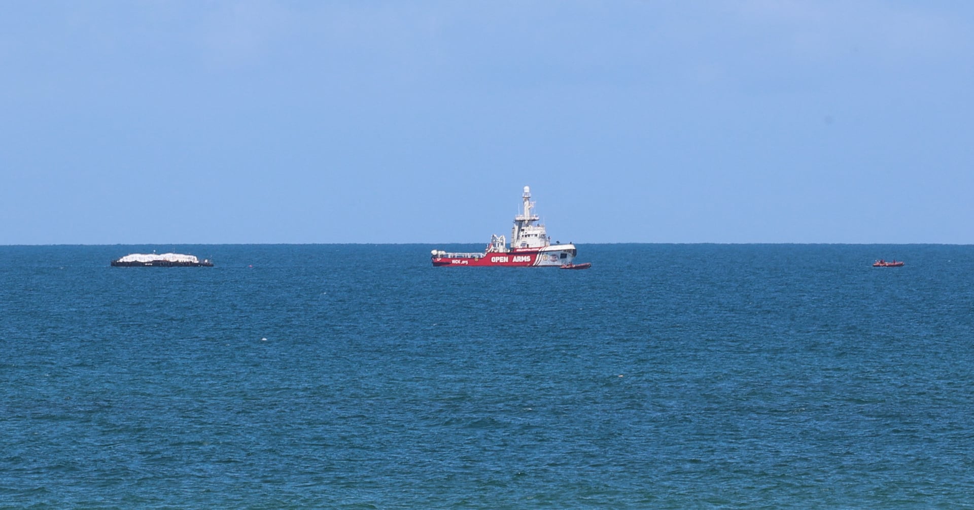 "Humanitarian Aid Ship Reaches Gaza Coast Amid Israel-Hamas Conflict"