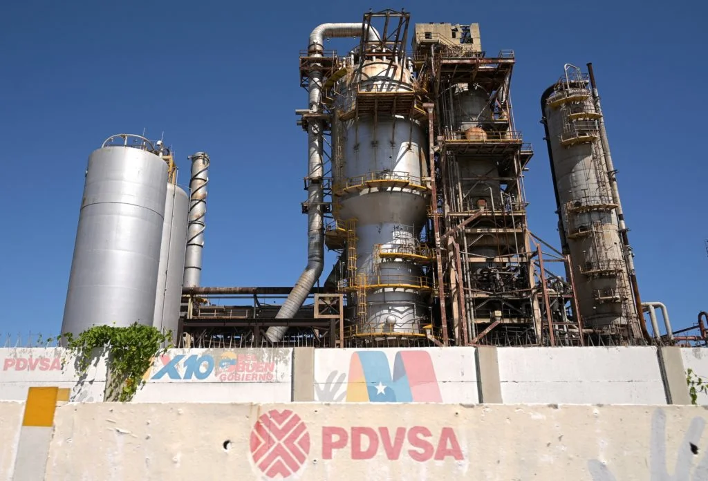 US eases PDVSA sanctions as Fed hints at a single rate cut this year