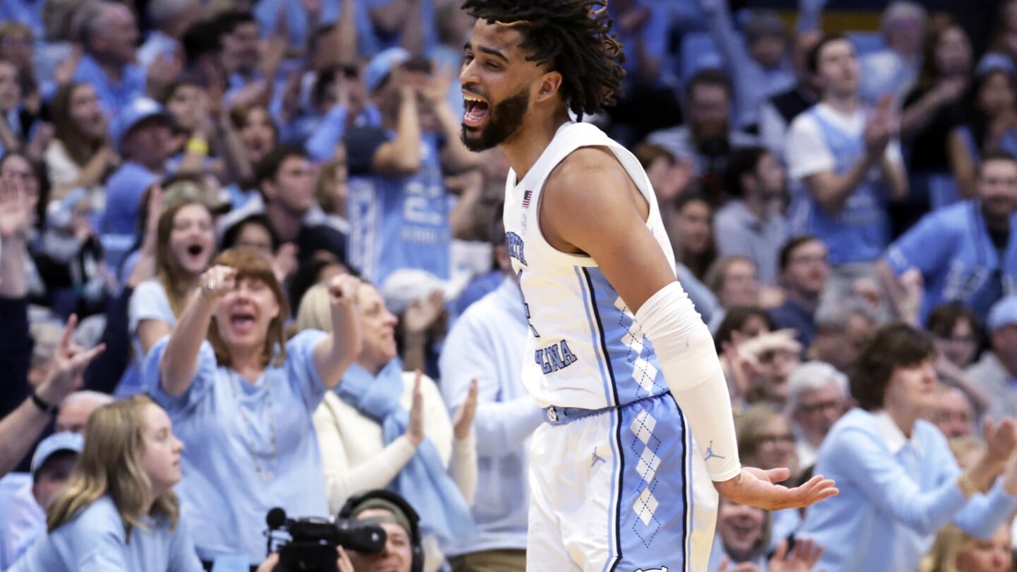 Featured image for "UNC's RJ Davis and Coach Hubert Davis Sweep ACC Honors in 2023-24 Season"