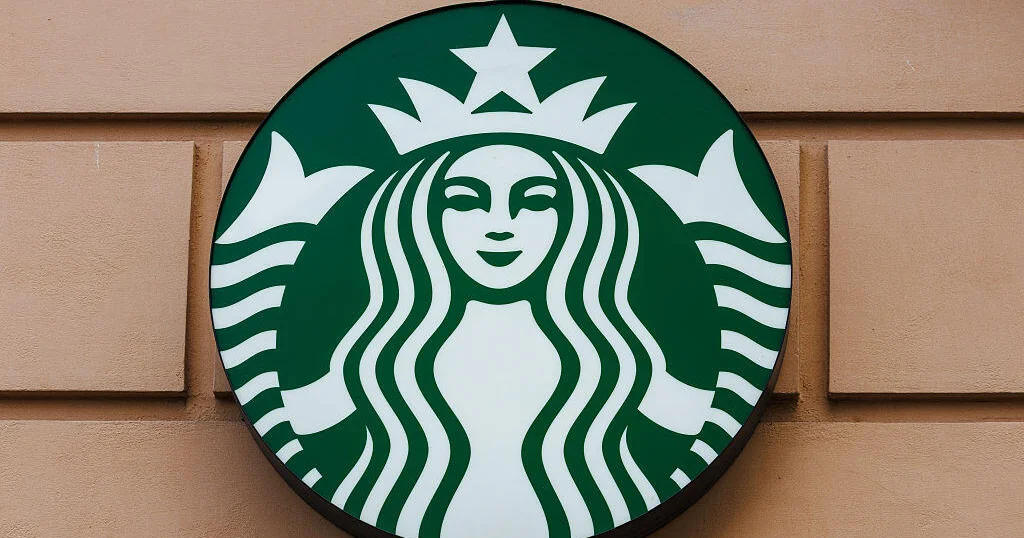 Featured image for Starbucks Employees Sue Over Costly Dress Code