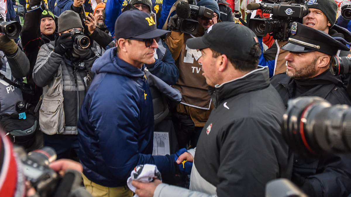 "The Battle for Glory: The Intense Showdown Between Michigan and Ohio State Takes Center Stage"
