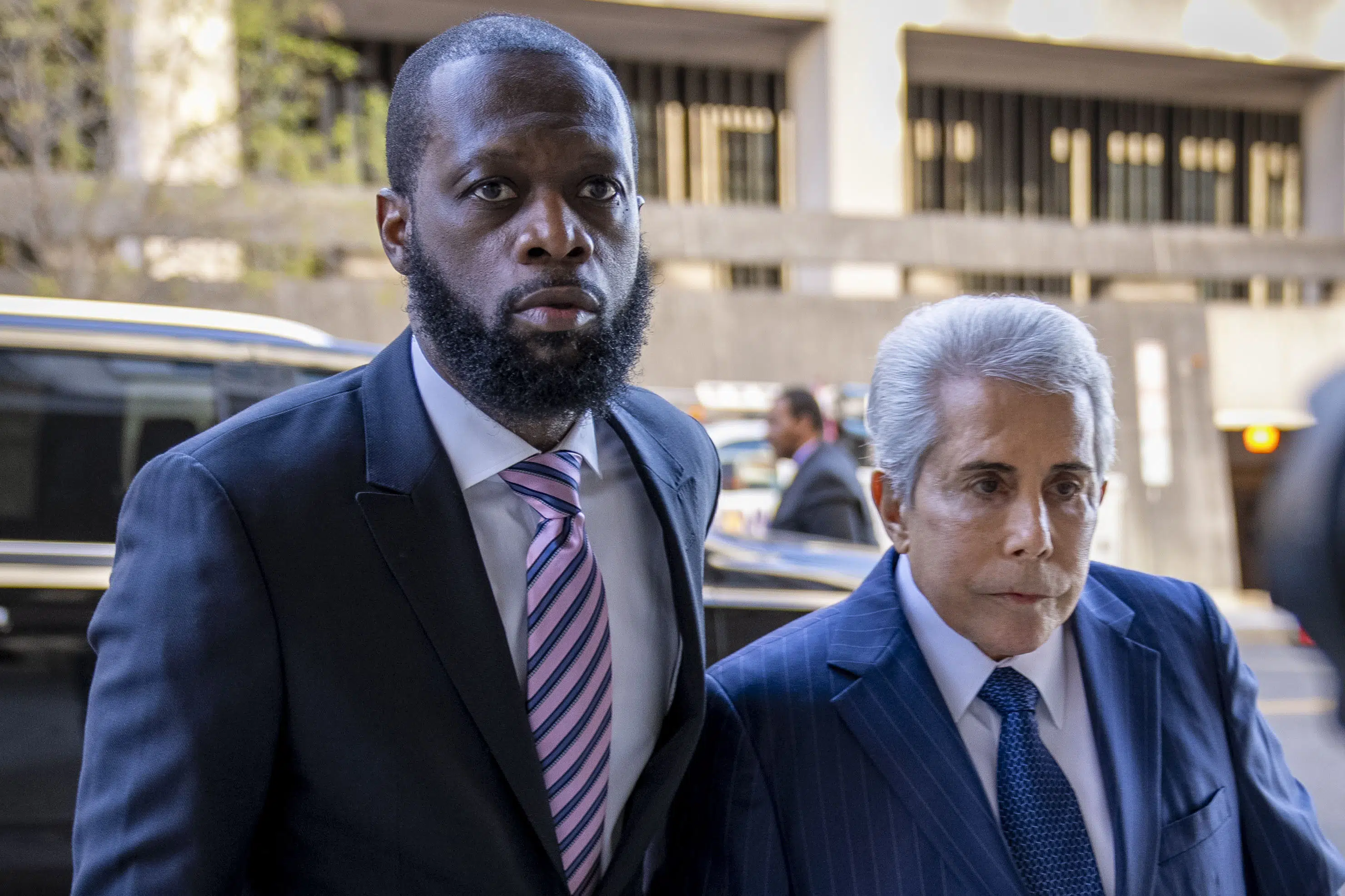 Fugees rapper defends against political conspiracy charges.
