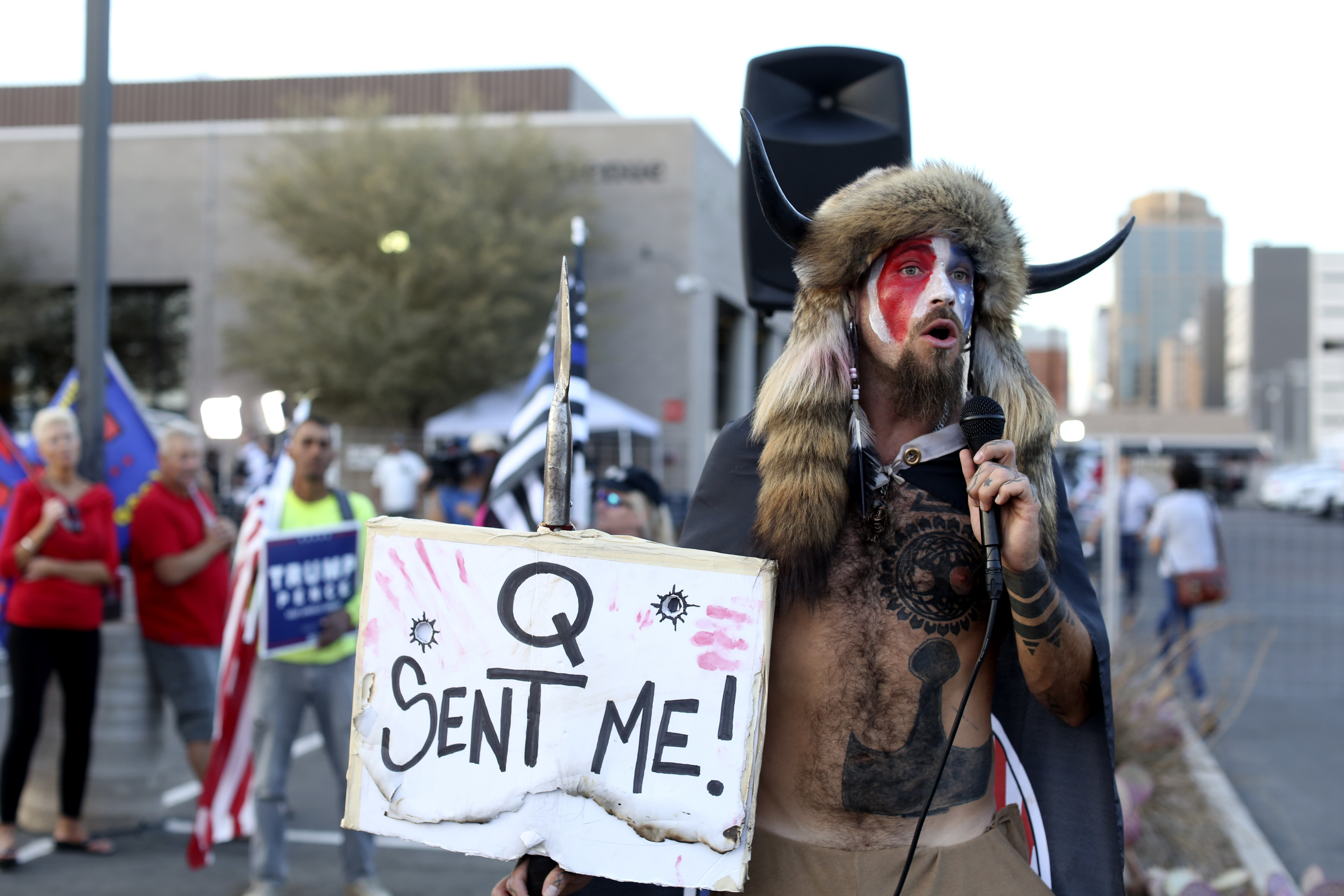 Featured image for DOJ fights QAnon Shaman's attempt to overturn Jan. 6 sentence