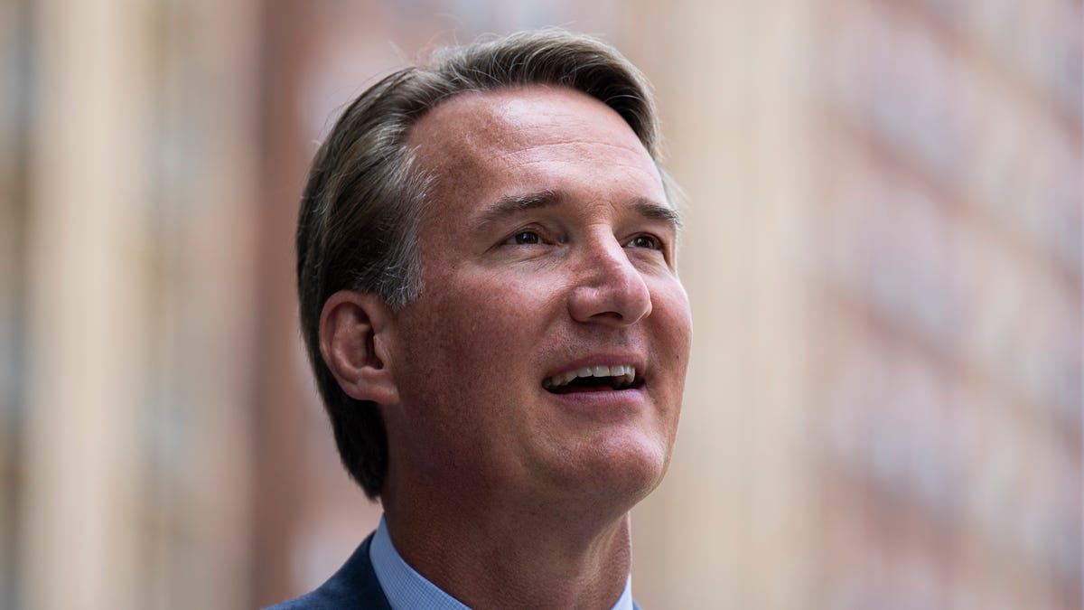 Featured image for "Governor Youngkin's Controversial Pardon Sparks Outrage and Accusations of Political Manipulation"