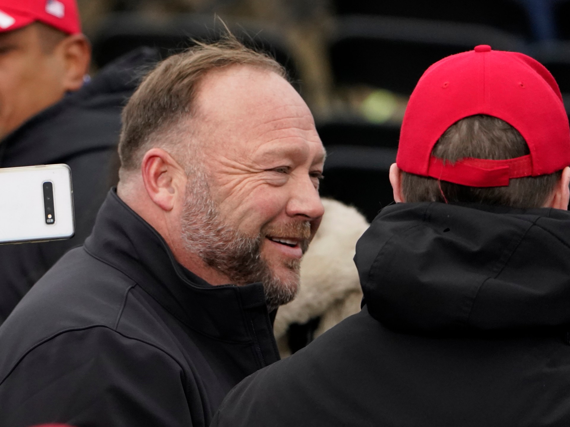 Elon Musk Reinstates Alex Jones on X, Sparking Controversy