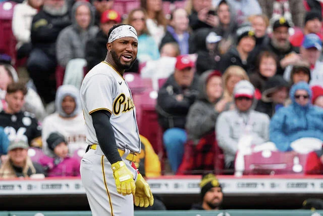 Reds Dominate Pirates with Home Runs and Shutdown Pitching.