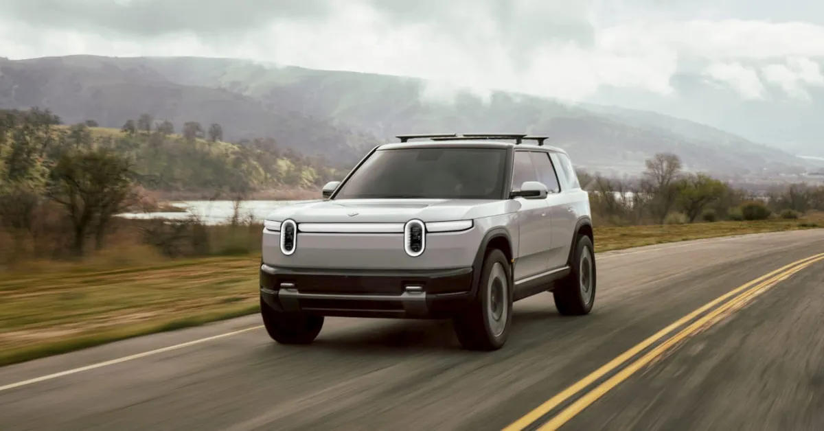 Featured image for Rivian Announces Staff Cuts Ahead of R2 Launch Amid Market Slowdown
