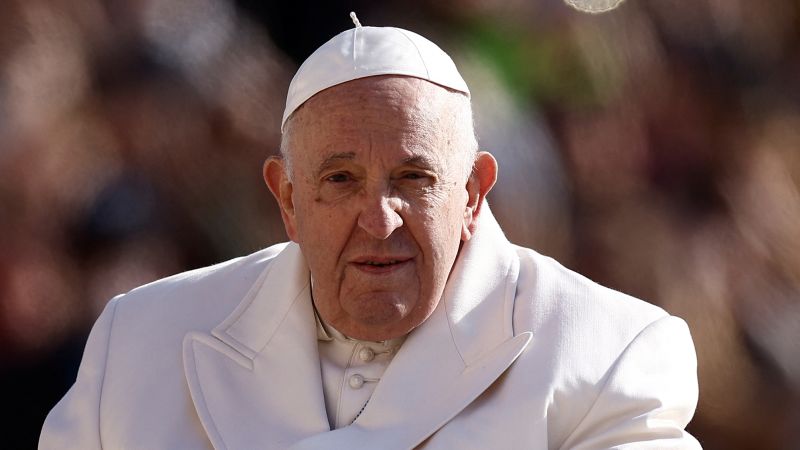 Pope Francis grants women voting rights at bishops' meeting.
