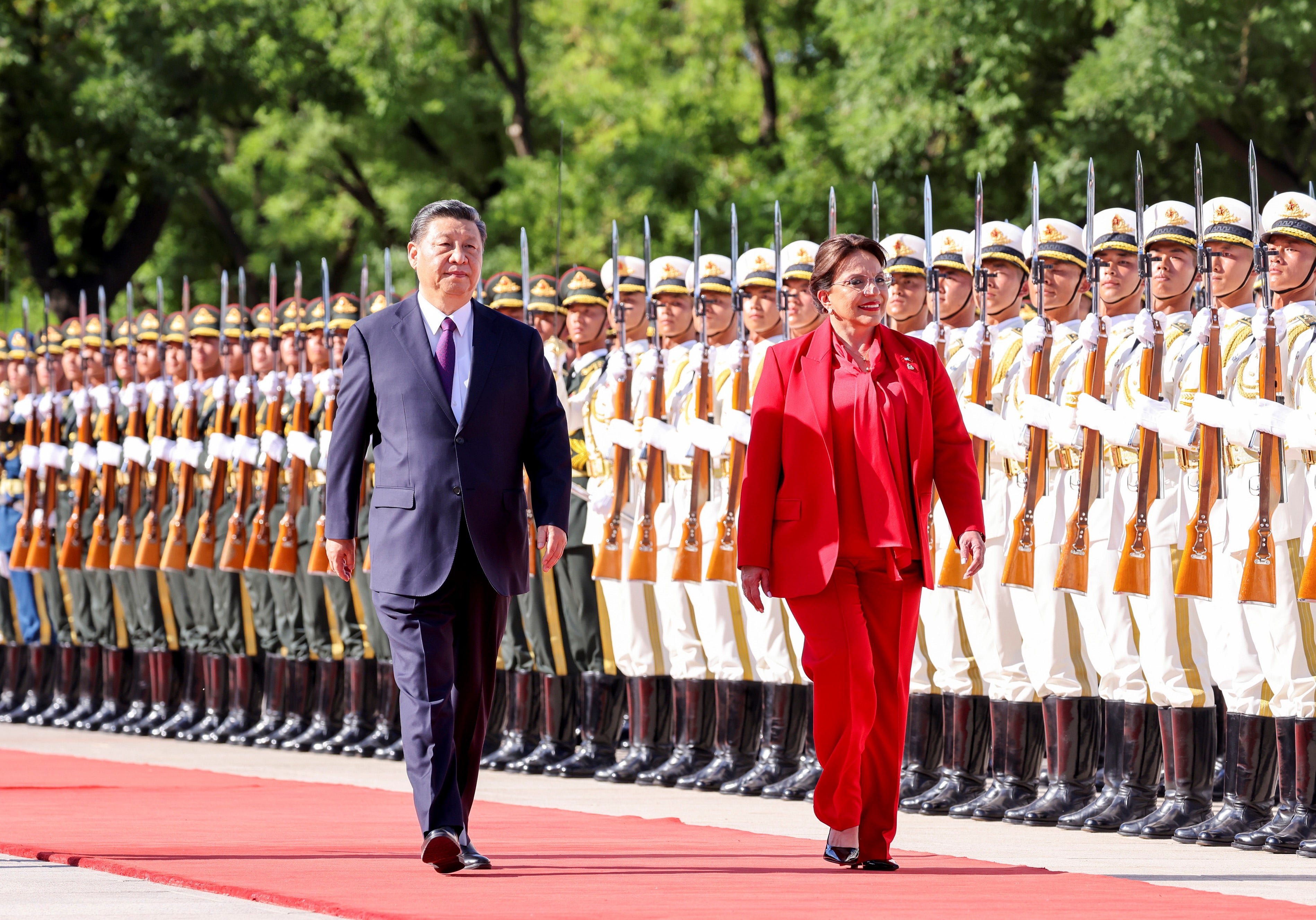 Chinese and Honduran leaders meet in Beijing amidst controversy and trade talks.