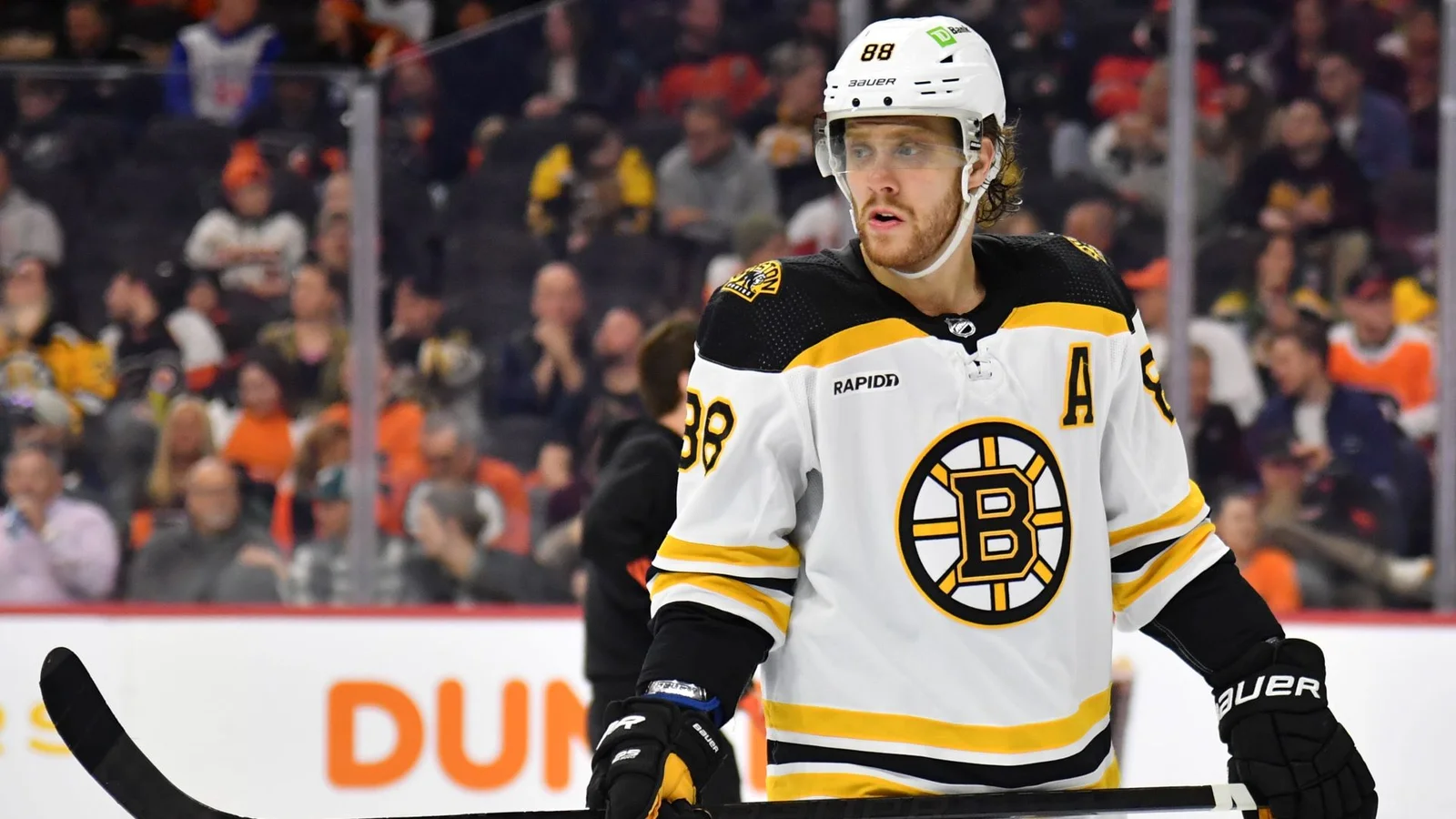 Bruins' Pastrnak Plays Through Injury, Uncertainty Looms for Bergeron and Krejci.