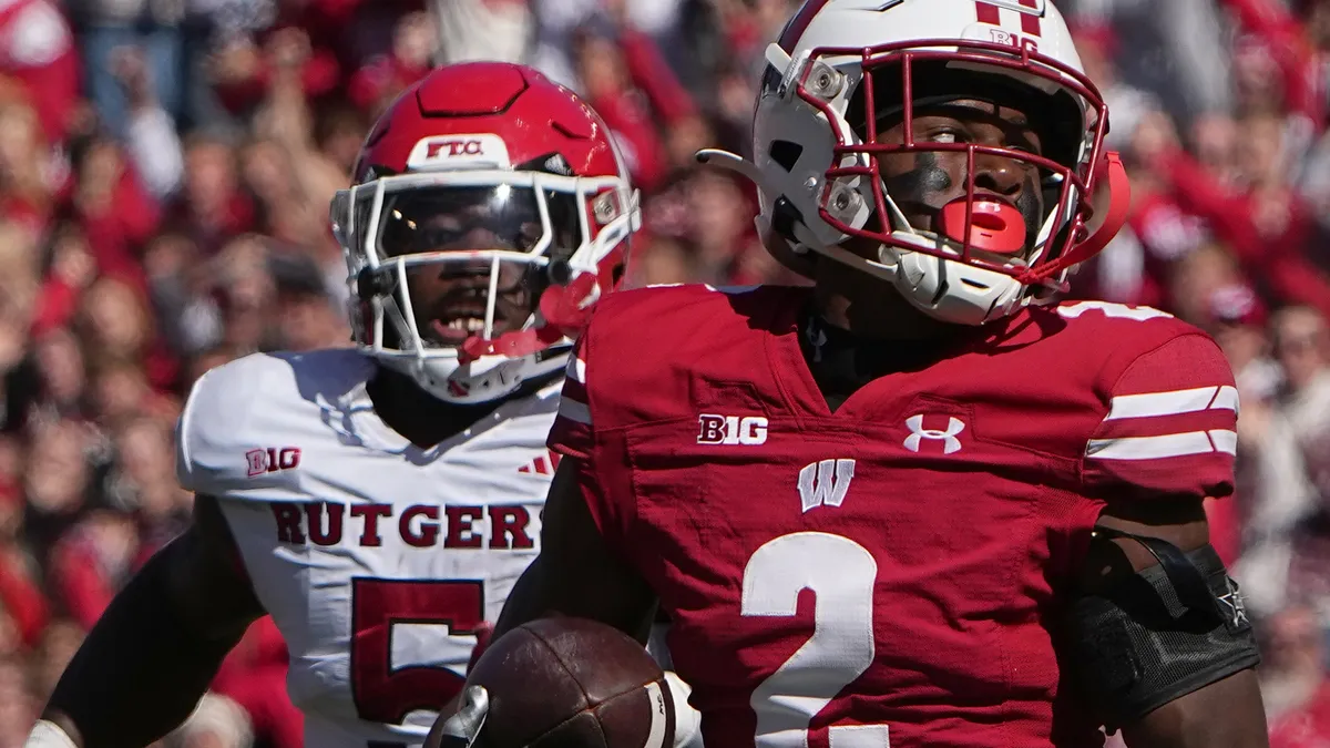 "Wisconsin dominates Rutgers with a 24-13 victory, fans celebrate Tucker Ashcraft's first touchdown"
