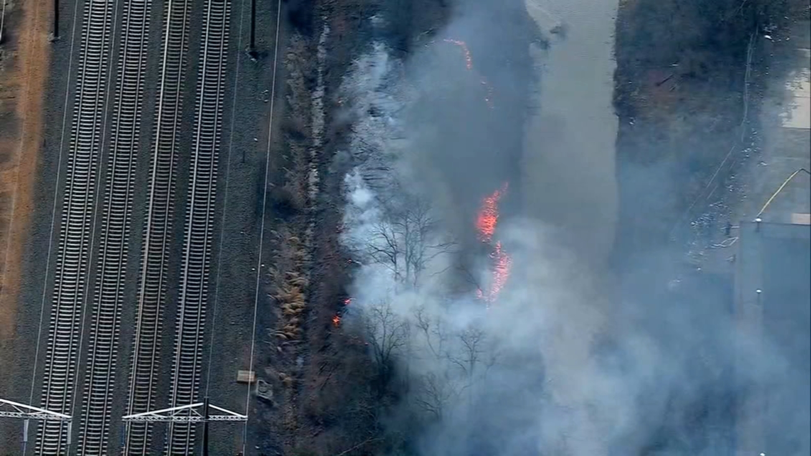 Featured image for Brush Fires Disrupt NJ Transit and Amtrak Services.
