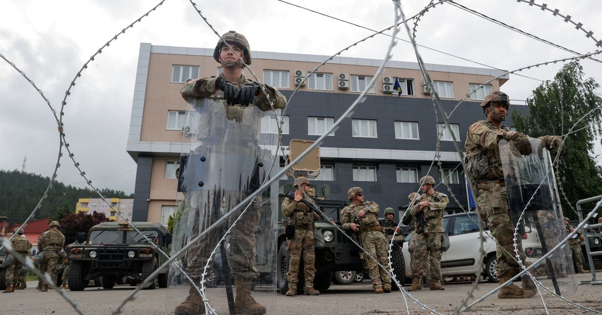 Tensions rise as Kosovo Serbs clash with police over town hall control.