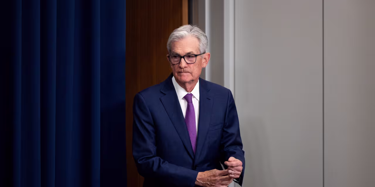 "Powell Cautious on Rate Cuts Despite Market Expectations"