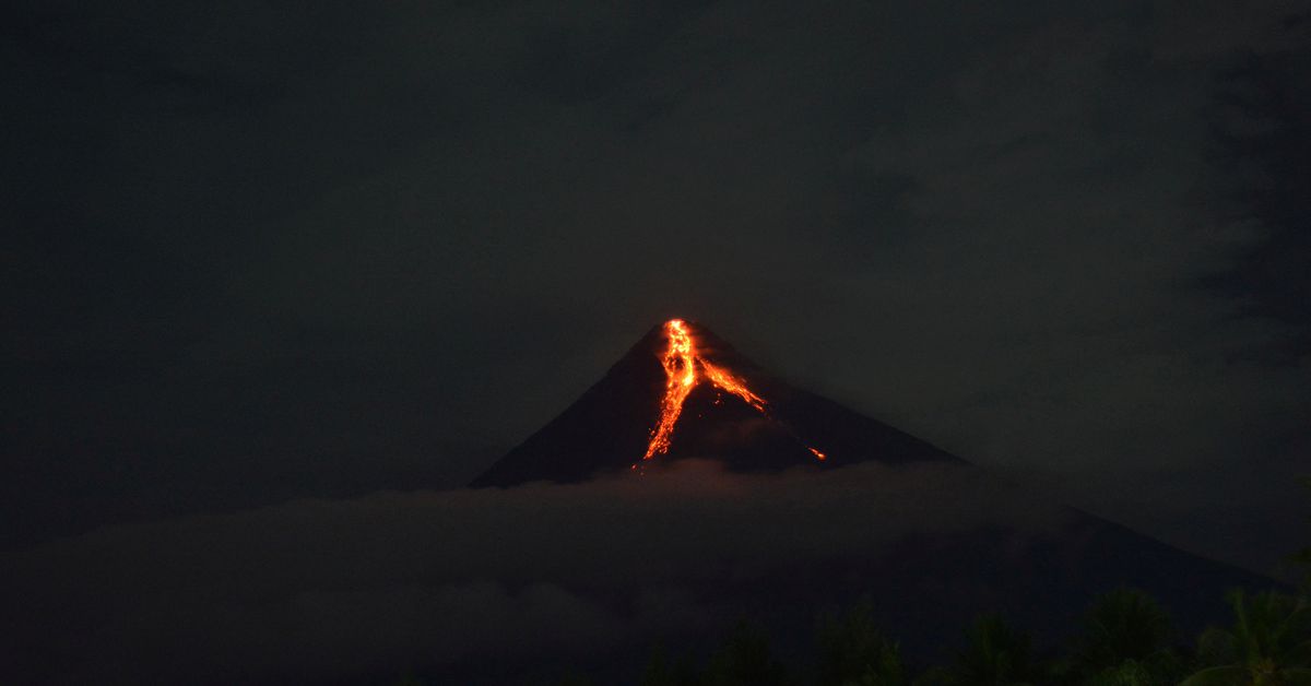 Mayon Volcano Displaces Residents and Lights Up Night Sky with Lava and Gas Eruptions.