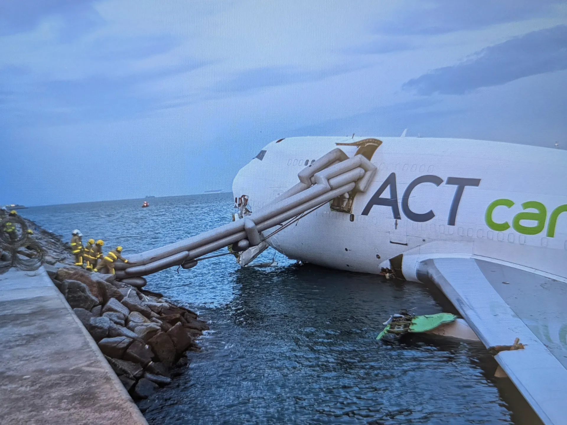 Featured image for Cargo Plane Skids Off Hong Kong Runway, Two Dead
