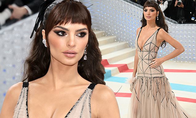 Emily Ratajkowski Stuns at Met Gala 2023 in Plunging Gown and Micro-Fringe Haircut.