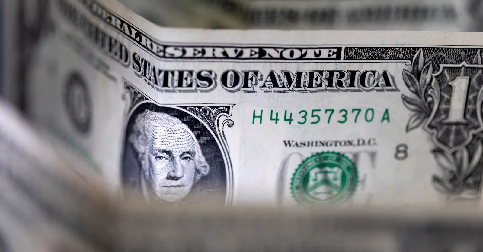 Dollar sinks to four-year low as Trump brushes off the slide
