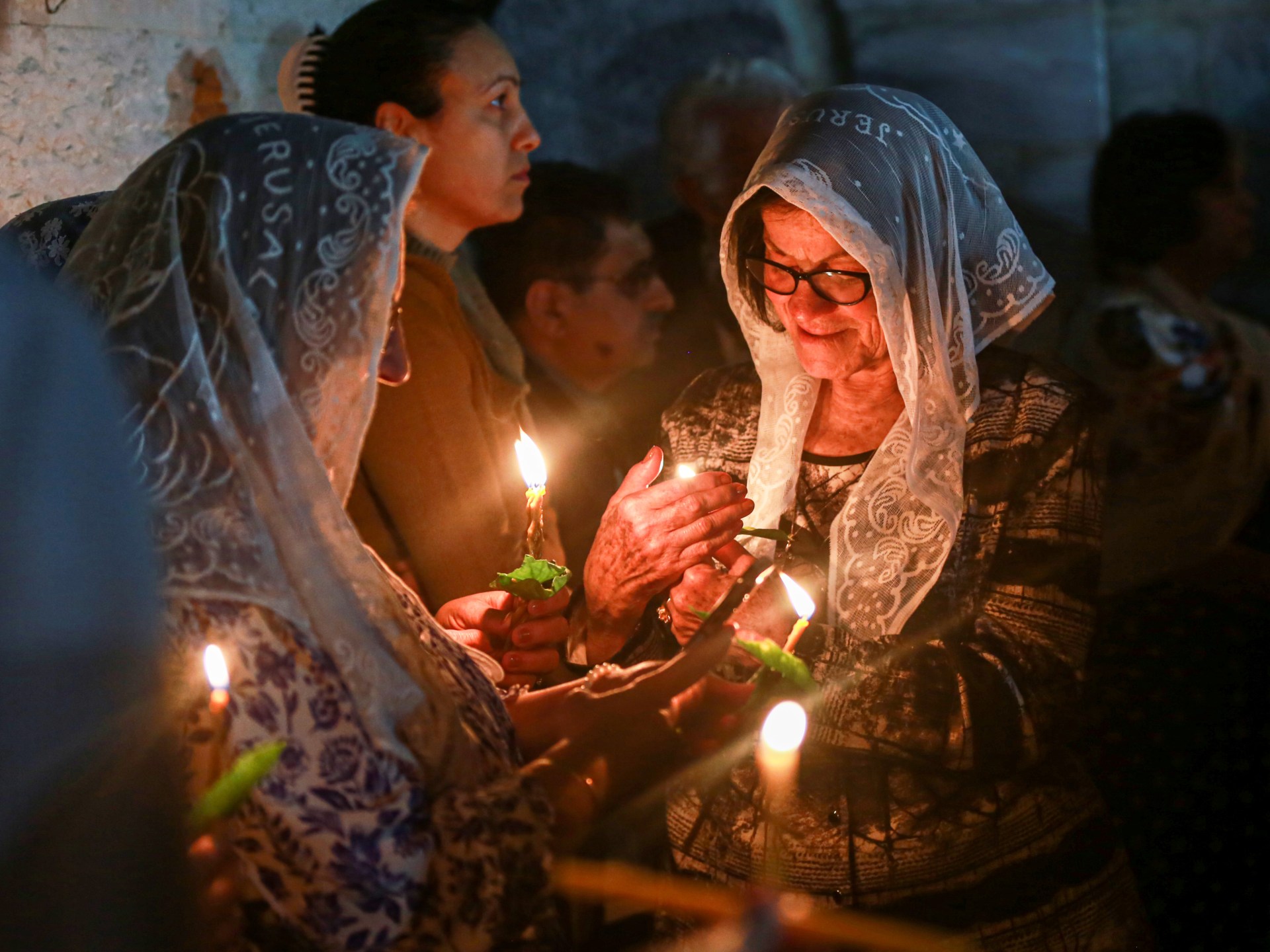 Christian Holy Fire Celebration in Jerusalem Faces Israeli Restrictions and Security Concerns