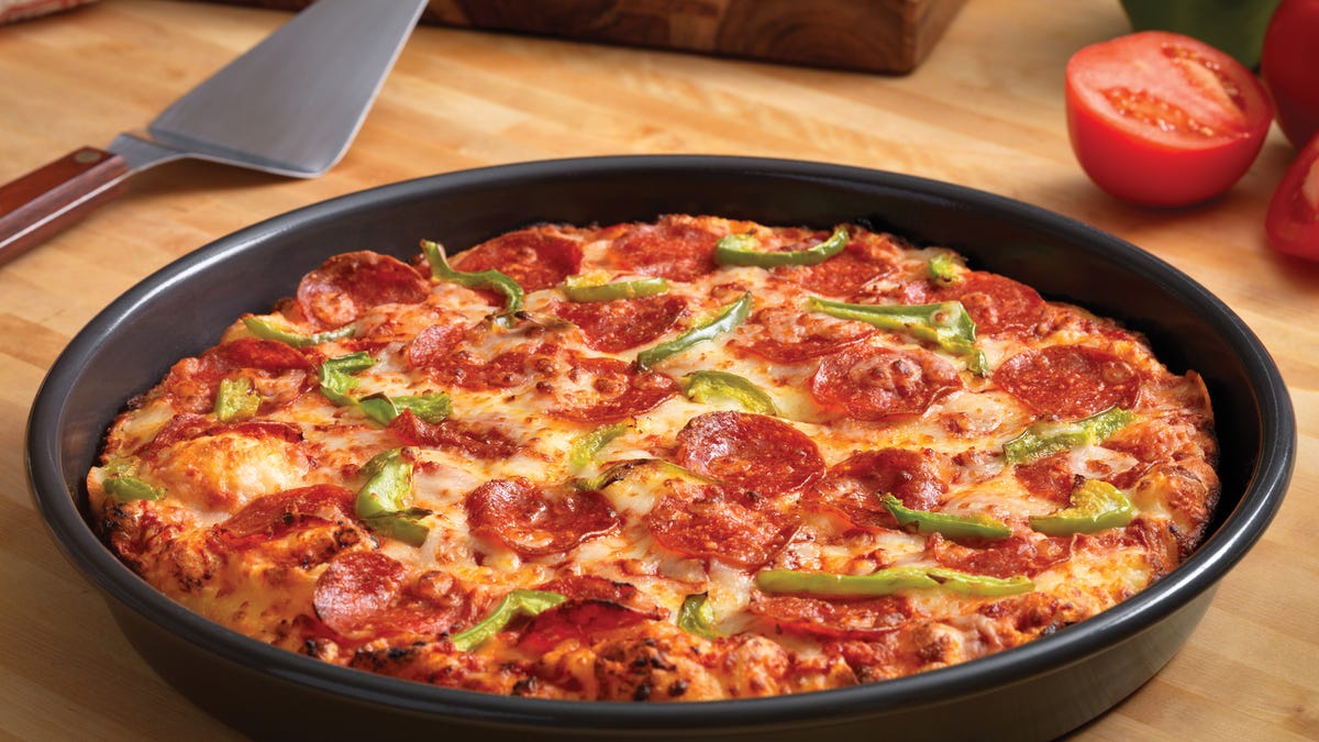 Featured image for "Unlocking the Delicious Rewards: Mastering Domino's Free Emergency Pizza Program"