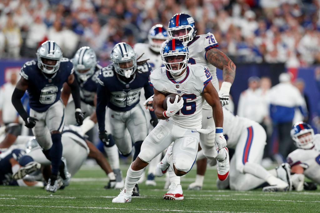 "Sunday Night Showdown: Giants vs. Cowboys - Predictions, Picks, and Odds"