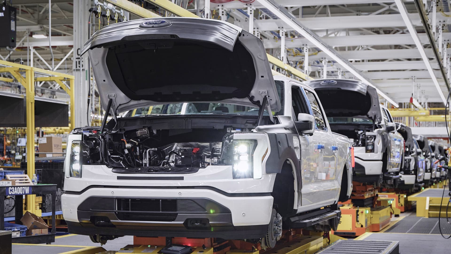 Featured image for Ford raises F-150 Lightning prices amid production restart.