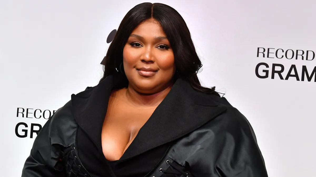 Featured image for Lizzo's Emotional Journey: From Lawsuits to Humanitarian Award