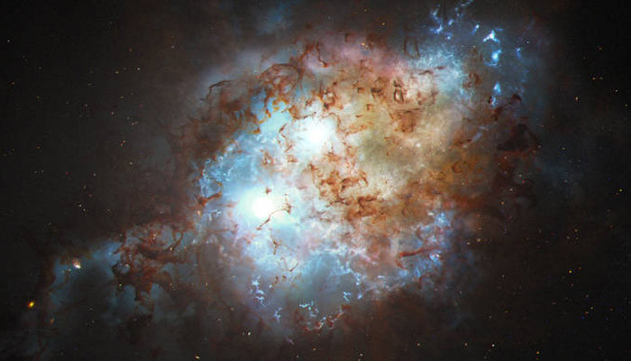 Hubble Telescope Discovers Rare Pair of Quasars in Merging Galaxies