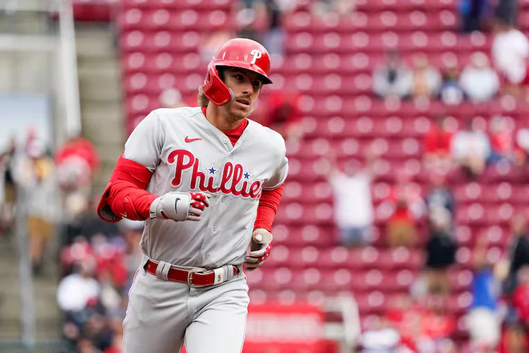 Phillies dominate Reds with nine-run first inning in blowout victory.