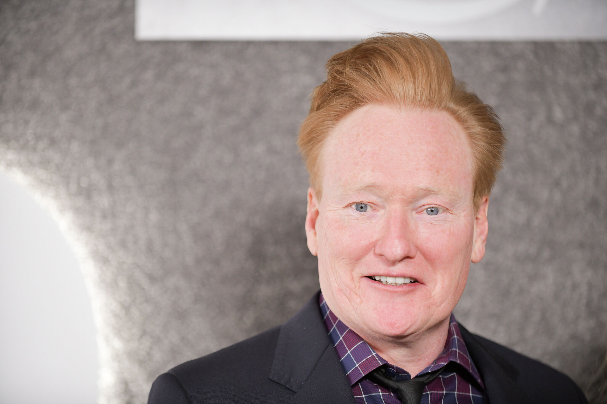 Featured image for Conan O'Brien visits Sally's Apizza in New Haven after initial rejection.