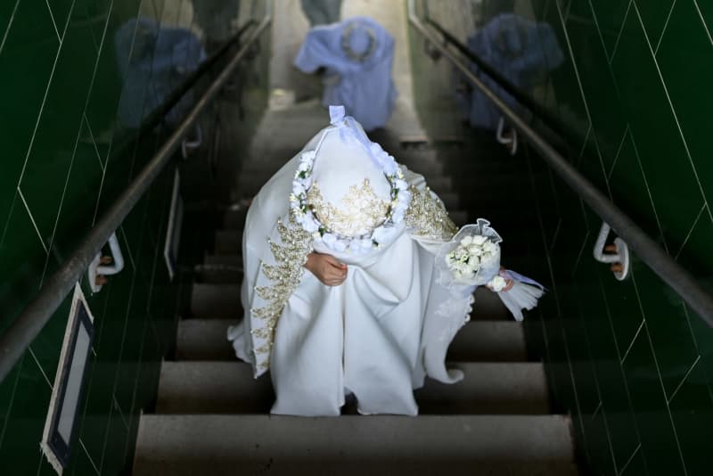 Featured image for Iraq's Legalization of Child Marriage Sparks Surge in Baghdad Bridal Market