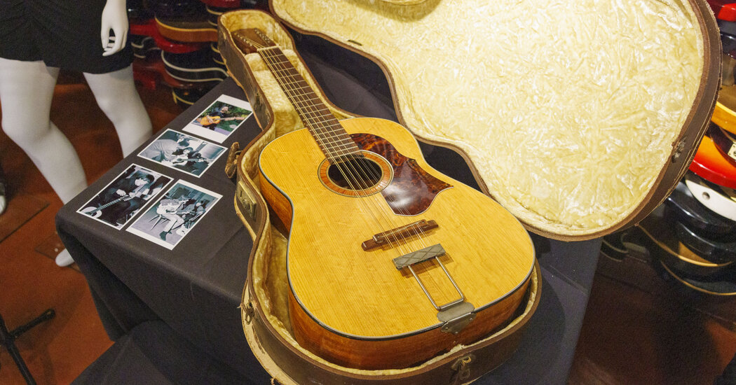 Featured image for John Lennon's Lost Guitar Breaks Beatles Auction Record at $2.9M