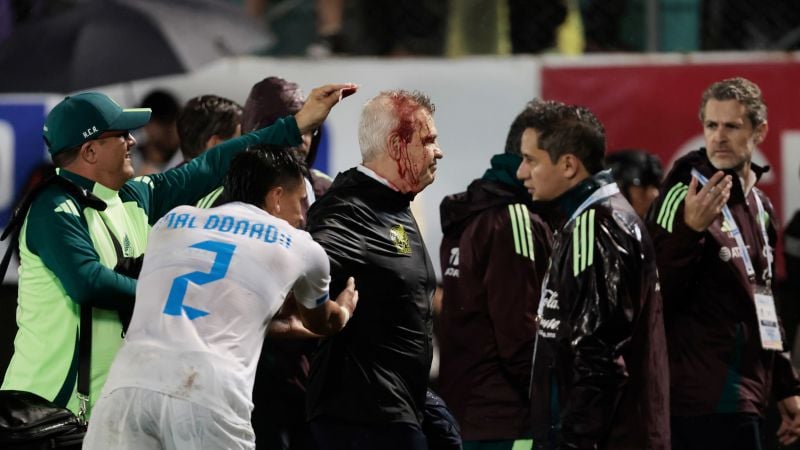 Featured image for Mexico Coach Aguirre Injured by Thrown Beer Can in Honduras
