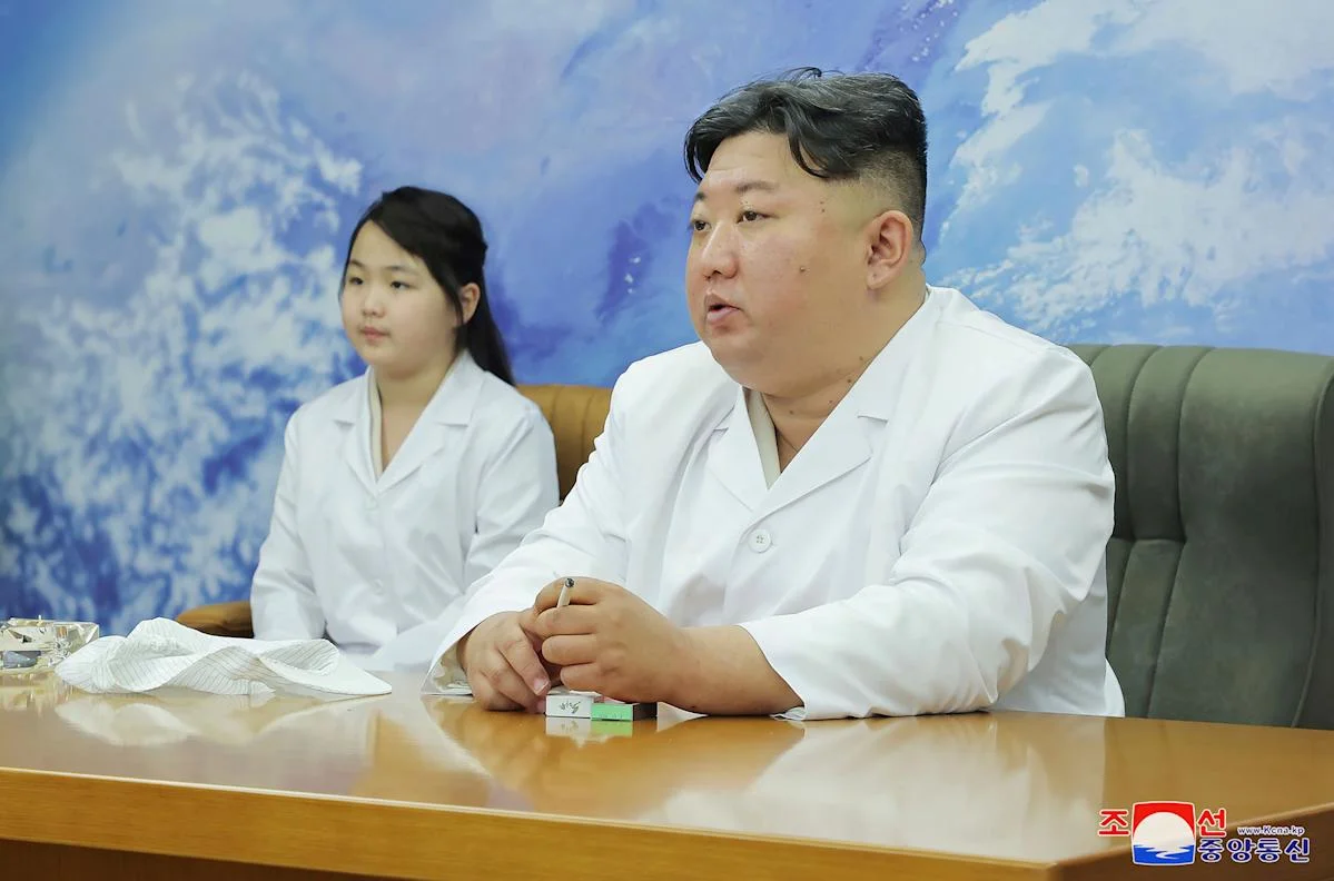 Kim Jong Un Inspects Military Spy Satellite for Possible Launch