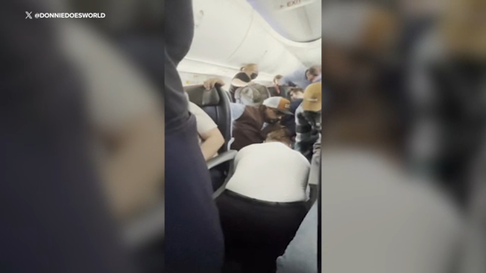 Featured image for "Passenger Duct-Taped on American Airlines Flight After Attempting to Open Emergency Door"