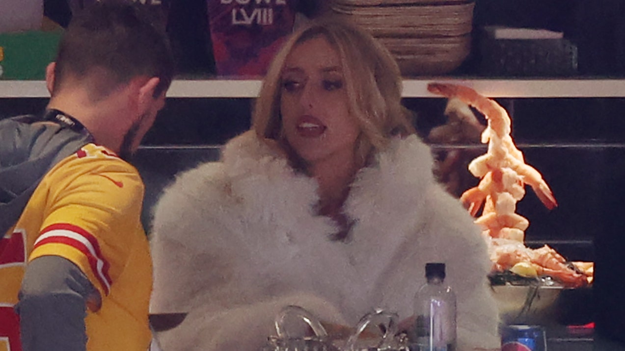 Featured image for "Brittany Mahomes Rocks Red Latex Jumpsuit at Super Bowl, Adding WAG Spin to Mob Wife Aesthetic"