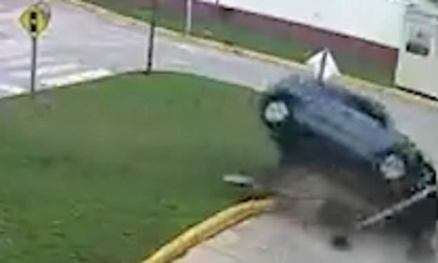 Featured image for Driving test disaster: Woman flips car and crashes into lamp post.