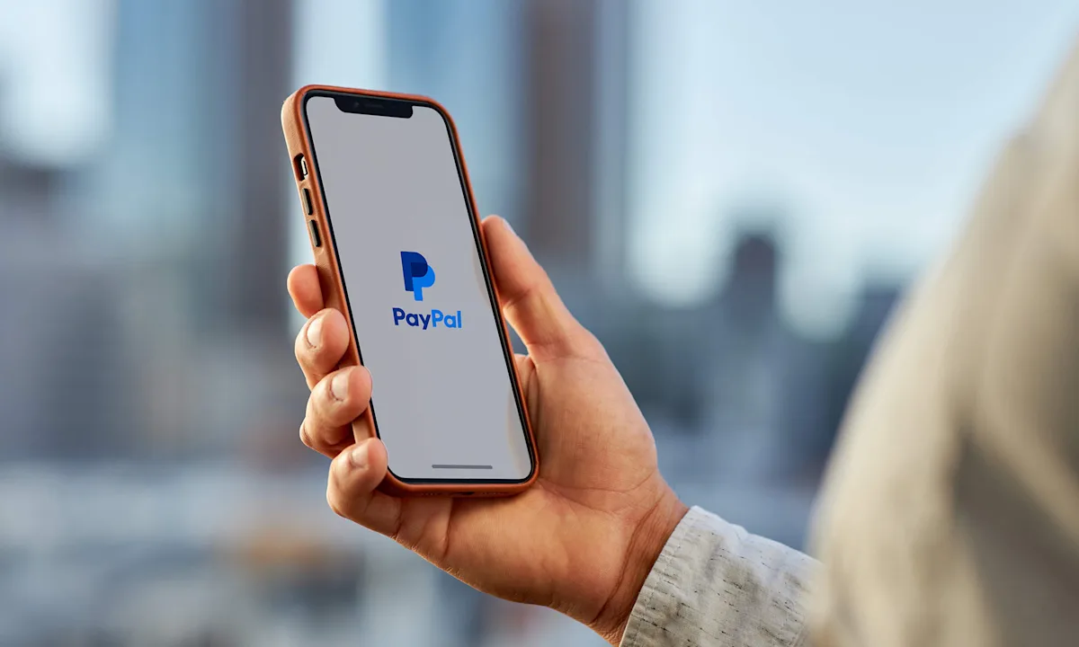"Analyzing PayPal Stock: Earnings, Downgrades, and Investment Opportunities"
