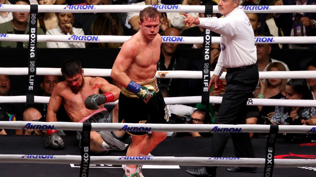 Featured image for Canelo Alvarez defeats John Ryder by decision in epic homecoming fight.