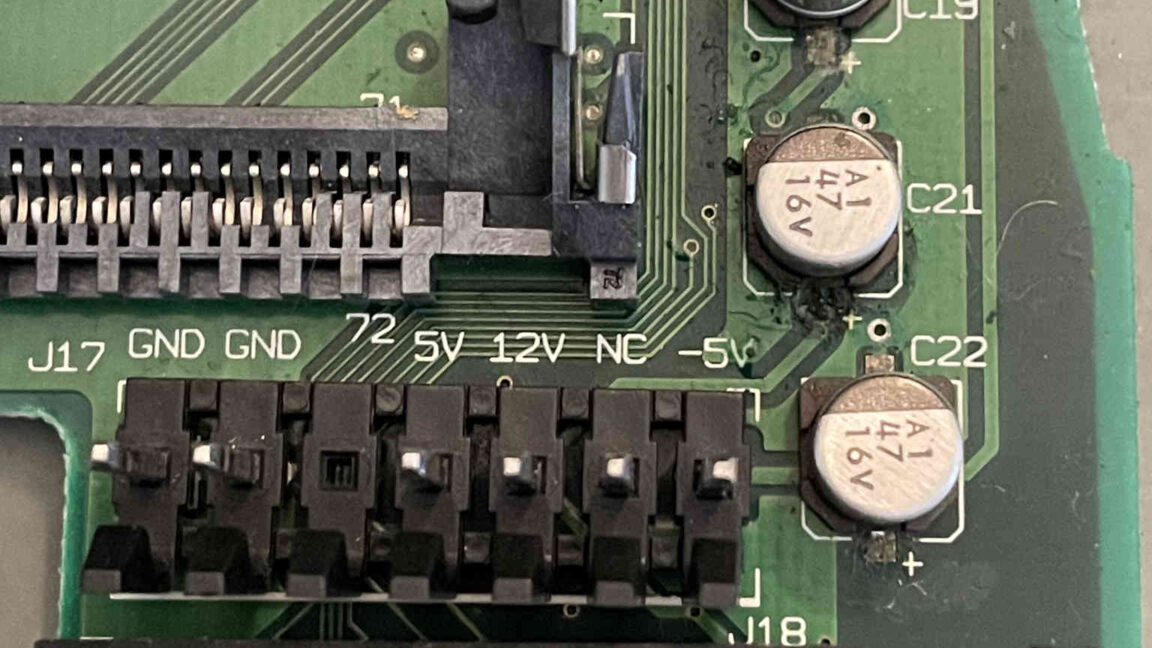 Featured image for Mid-'90s Macs' Upside-Down Capacitor Mystery Unveiled by Hobbyists
