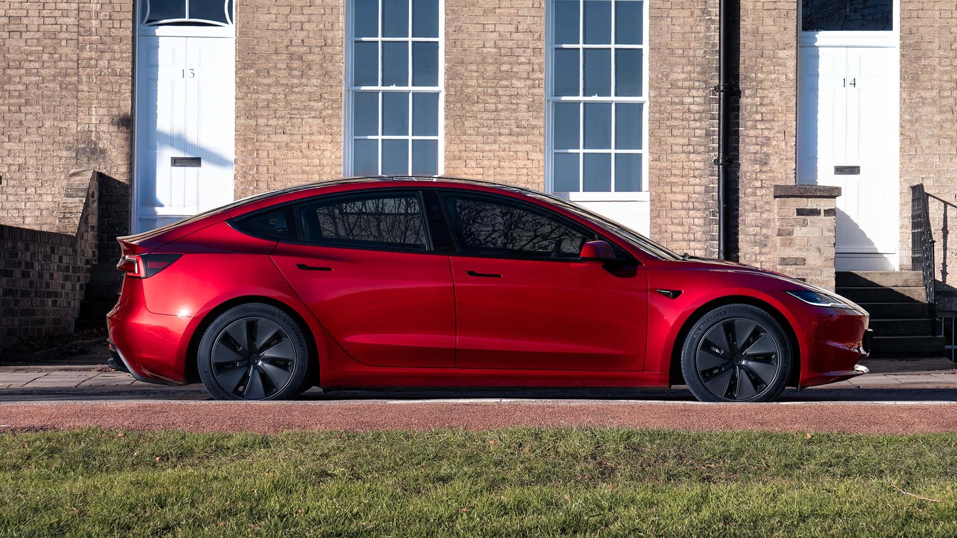 "Tesla's Tumbling Fortunes: Analysts Warn of Potential Bust as Sales Slip"