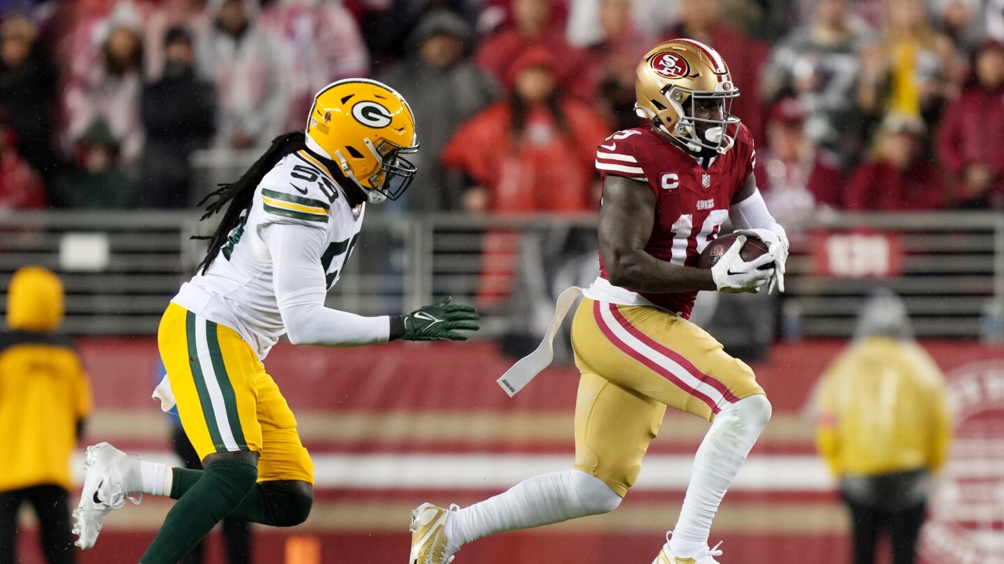 Featured image for "49ers' Deebo Samuel Exits Playoff Game with Shoulder Injury, Former Tennessee WR Jauan Jennings Goes Viral"