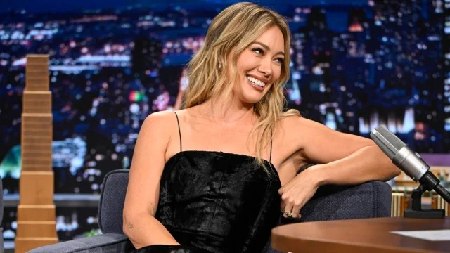 Hilary Duff Stuns in a Two-String Black Helmut Lang Midi on Fallon