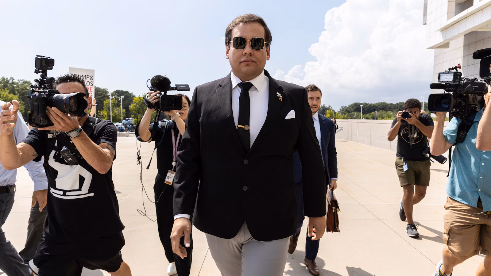 Featured image for Trump's Clemency for George Santos Sparks Controversy and Legal Uncertainty