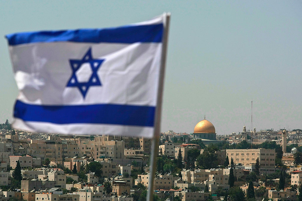 "Israel's IDF Launches Airstrikes on Hamas Targets in Gaza, Poised for Invasion"